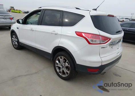 2016 Ford Escape Titanium z USA, uszkodzony, nr VIN 1FMCU0J97GUC78195